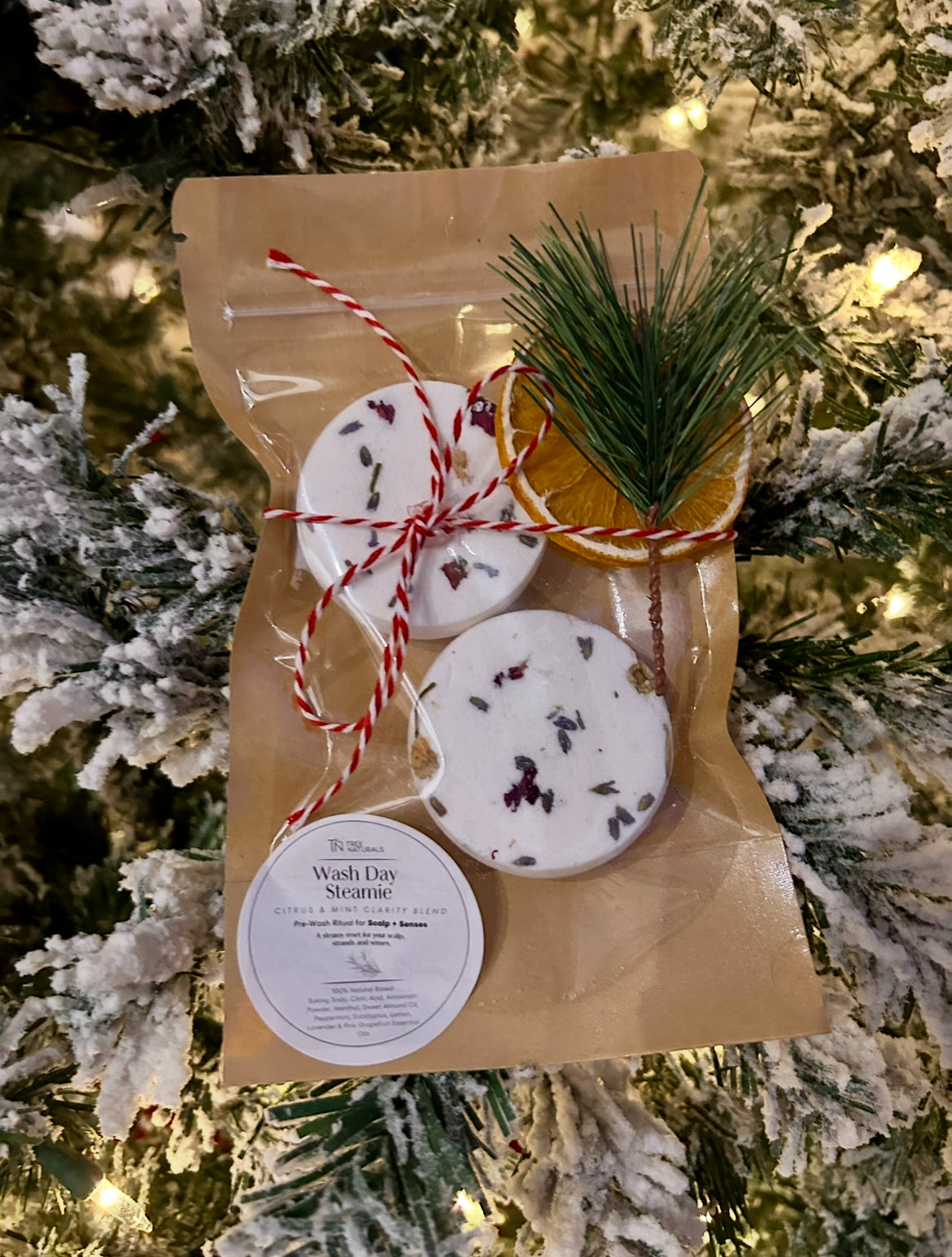 Deluxe Wash Day Steamies duo in festive pouch, citrus and mint aromatherapy shower steamers for wash day and self-care.