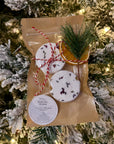 Deluxe Wash Day Steamies duo in festive pouch, citrus and mint aromatherapy shower steamers for wash day and self-care.